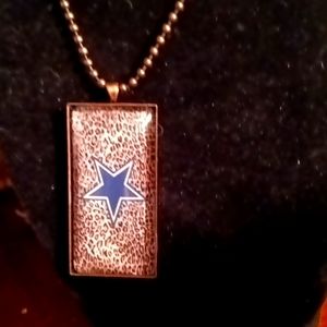 Dallas Cowboys Blue star with leopard print background pendent necklace.